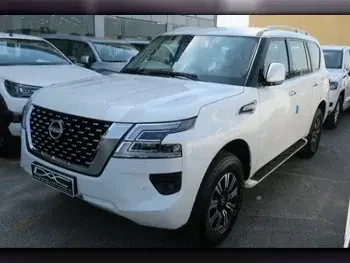 Nissan  Patrol  SE  2023  Automatic  0 Km  6 Cylinder  Four Wheel Drive (4WD)  SUV  White  With Warranty