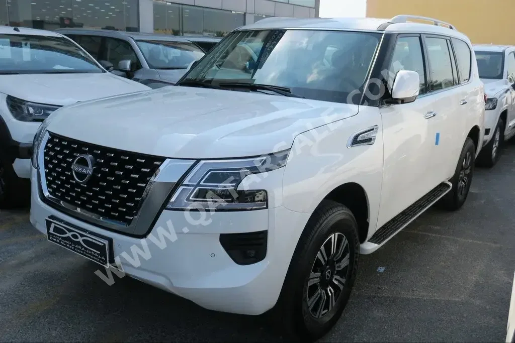 Nissan  Patrol  SE  2023  Automatic  0 Km  6 Cylinder  Four Wheel Drive (4WD)  SUV  White  With Warranty