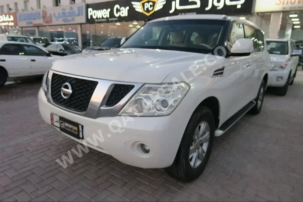 Nissan  Patrol  SE  2013  Automatic  204,000 Km  8 Cylinder  Four Wheel Drive (4WD)  SUV  White