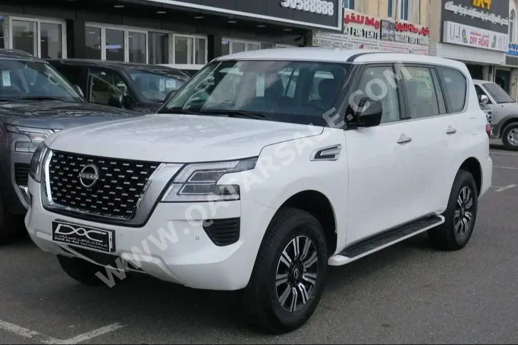 Nissan  Patrol  XE  2023  Automatic  0 Km  6 Cylinder  Four Wheel Drive (4WD)  SUV  White  With Warranty