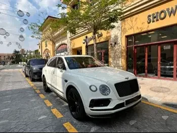 Bentley  Bentayga  2017  Automatic  96,000 Km  12 Cylinder  Four Wheel Drive (4WD)  SUV  White