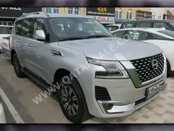 Nissan  Patrol  Titanium  2023  Automatic  0 Km  6 Cylinder  Four Wheel Drive (4WD)  SUV  Silver  With Warranty