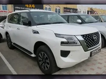 Nissan  Patrol  XE  2023  Automatic  0 Km  6 Cylinder  Four Wheel Drive (4WD)  SUV  White  With Warranty