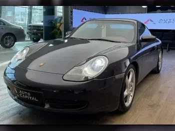 بورش  911  كاريرا  2000  اوتوماتيك  138,000 كم  6 سلندر  دفع خلفي  كوبيه \ سبورت  أسود