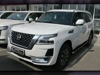 Nissan  Patrol  Titanium  2023  Automatic  5,000 Km  6 Cylinder  Four Wheel Drive (4WD)  SUV  White  With Warranty