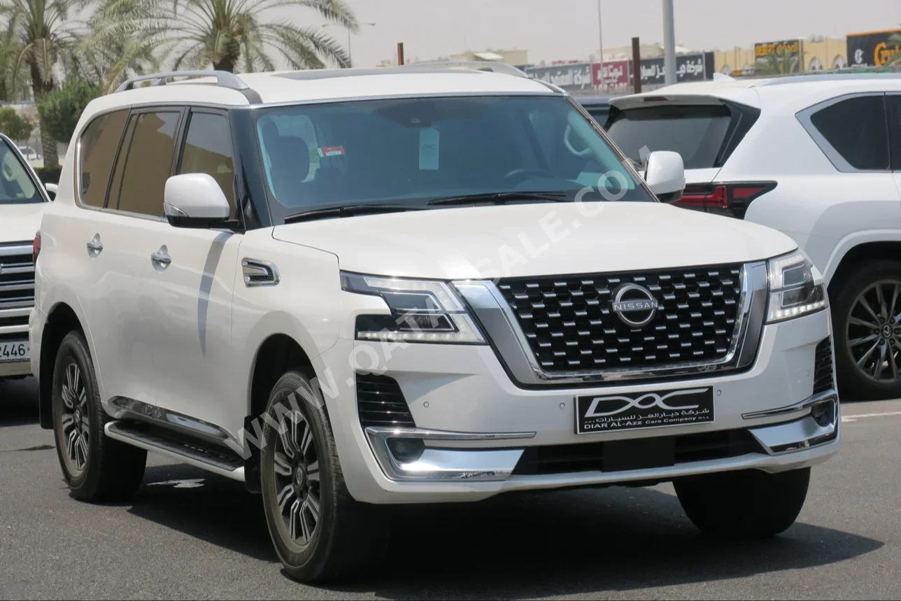 Nissan  Patrol  Titanium  2023  Automatic  33,000 Km  6 Cylinder  Four Wheel Drive (4WD)  SUV  White  With Warranty