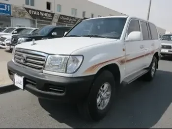 Toyota  Land Cruiser  GX  2004  Manual  342,000 Km  6 Cylinder  Four Wheel Drive (4WD)  SUV  White