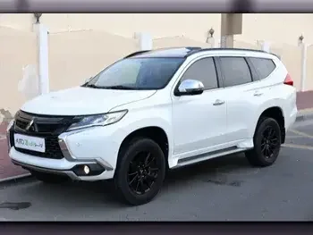 Mitsubishi  Pajero  Montero Sport  2019  Automatic  84,700 Km  6 Cylinder  Four Wheel Drive (4WD)  SUV  White  With Warranty