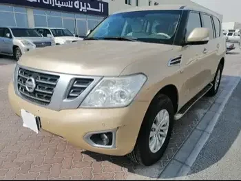 Nissan  Patrol  SE  2014  Automatic  375,000 Km  8 Cylinder  Four Wheel Drive (4WD)  SUV  Gold