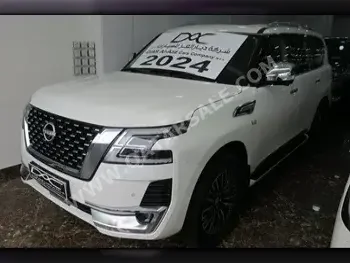 Nissan  Patrol  Platinum  2024  Automatic  0 Km  8 Cylinder  Four Wheel Drive (4WD)  SUV  White  With Warranty