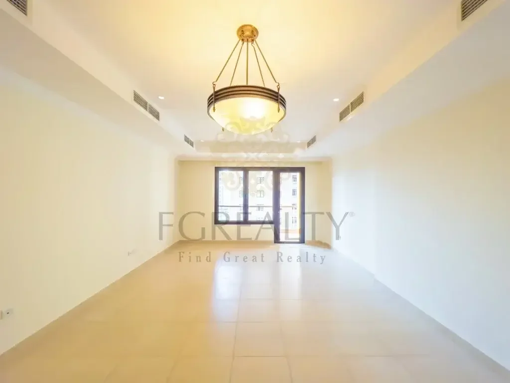 2 Bedrooms  Apartment  For Rent  in Doha -  The Pearl  Not Furnished