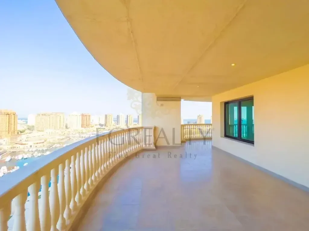 3 Bedrooms  Apartment  For Rent  in Doha -  The Pearl  Not Furnished