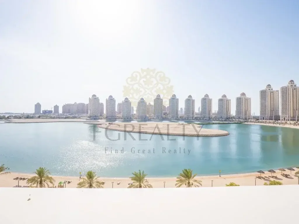 2 Bedrooms  Apartment  For Rent  in Doha -  The Pearl  Not Furnished