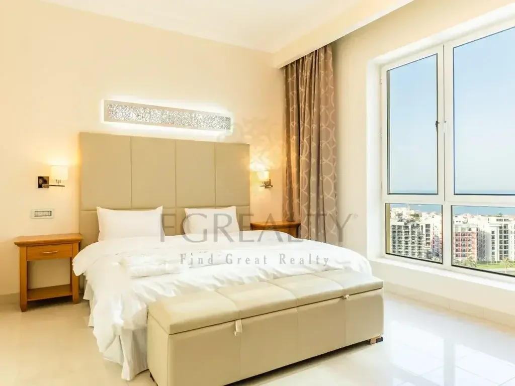 2 Bedrooms  Apartment  For Rent  in Doha -  The Pearl  Fully Furnished