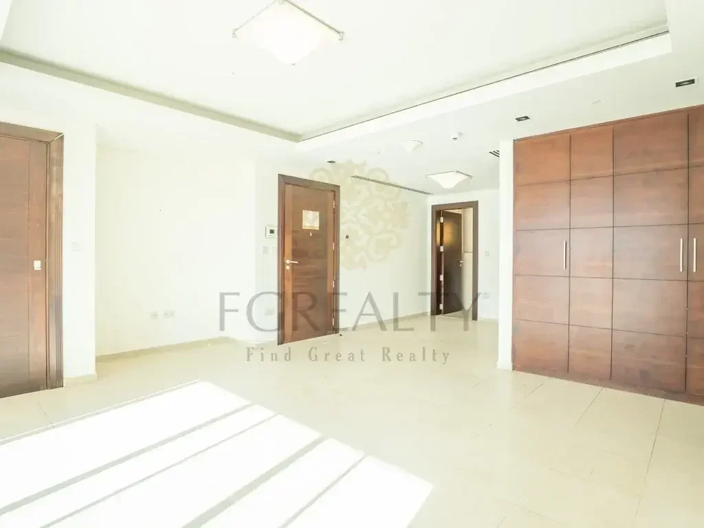 1 Bedrooms  Apartment  For Rent  in Doha -  The Pearl  Not Furnished