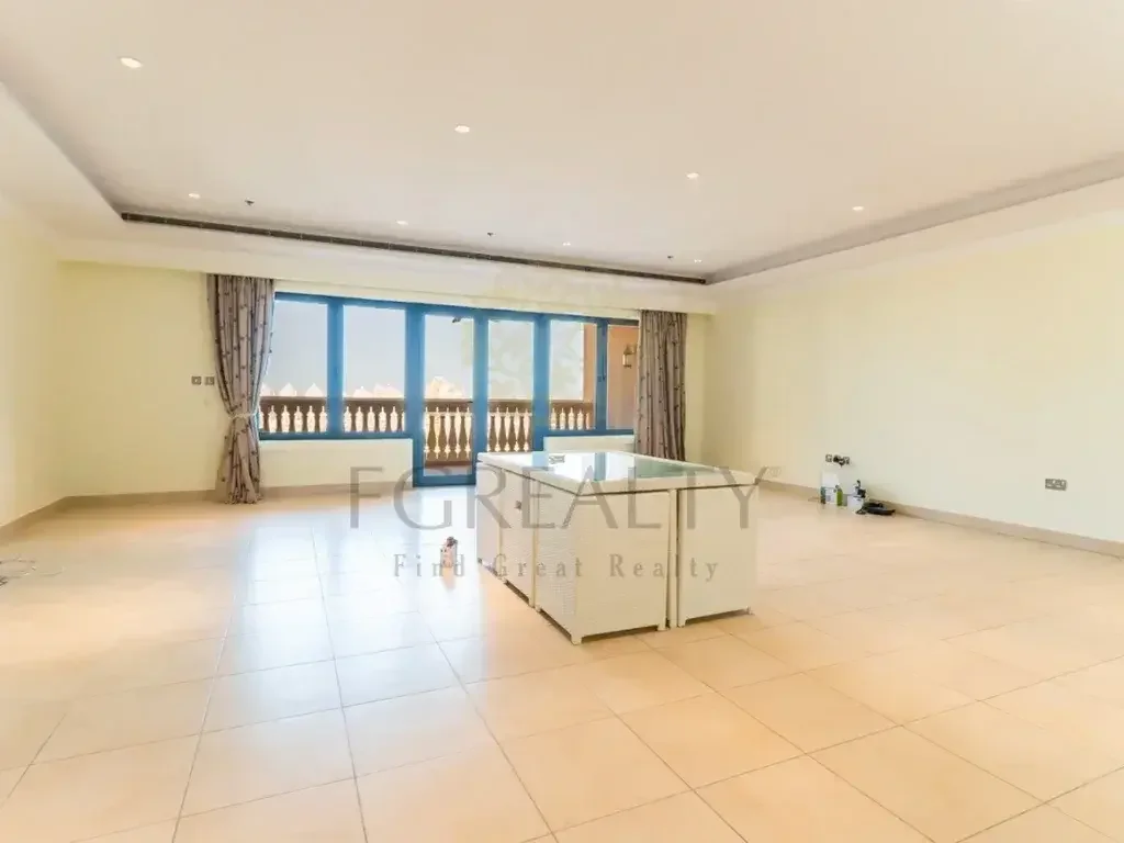 3 Bedrooms  Apartment  For Rent  in Doha -  The Pearl  Not Furnished