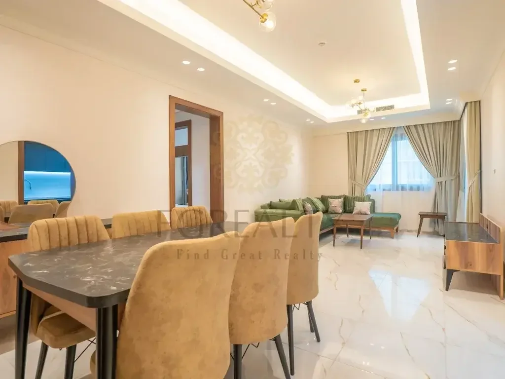 2 Bedrooms  Apartment  For Rent  in Doha -  The Pearl  Fully Furnished