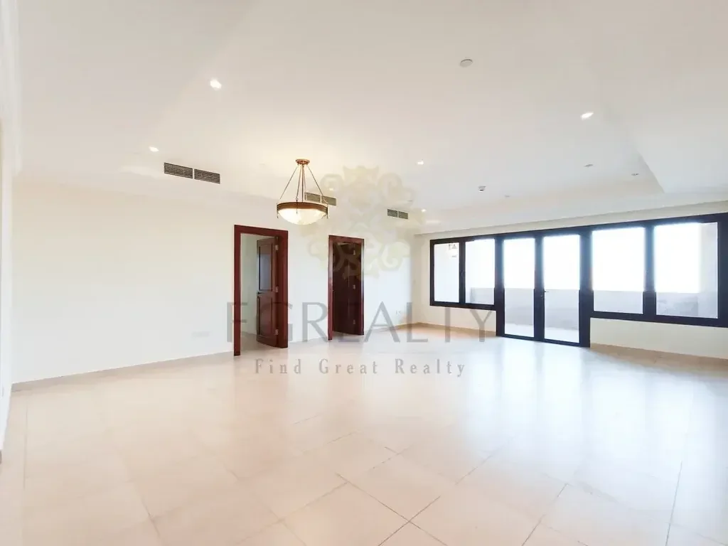 3 Bedrooms  Apartment  For Rent  in Doha -  The Pearl  Not Furnished