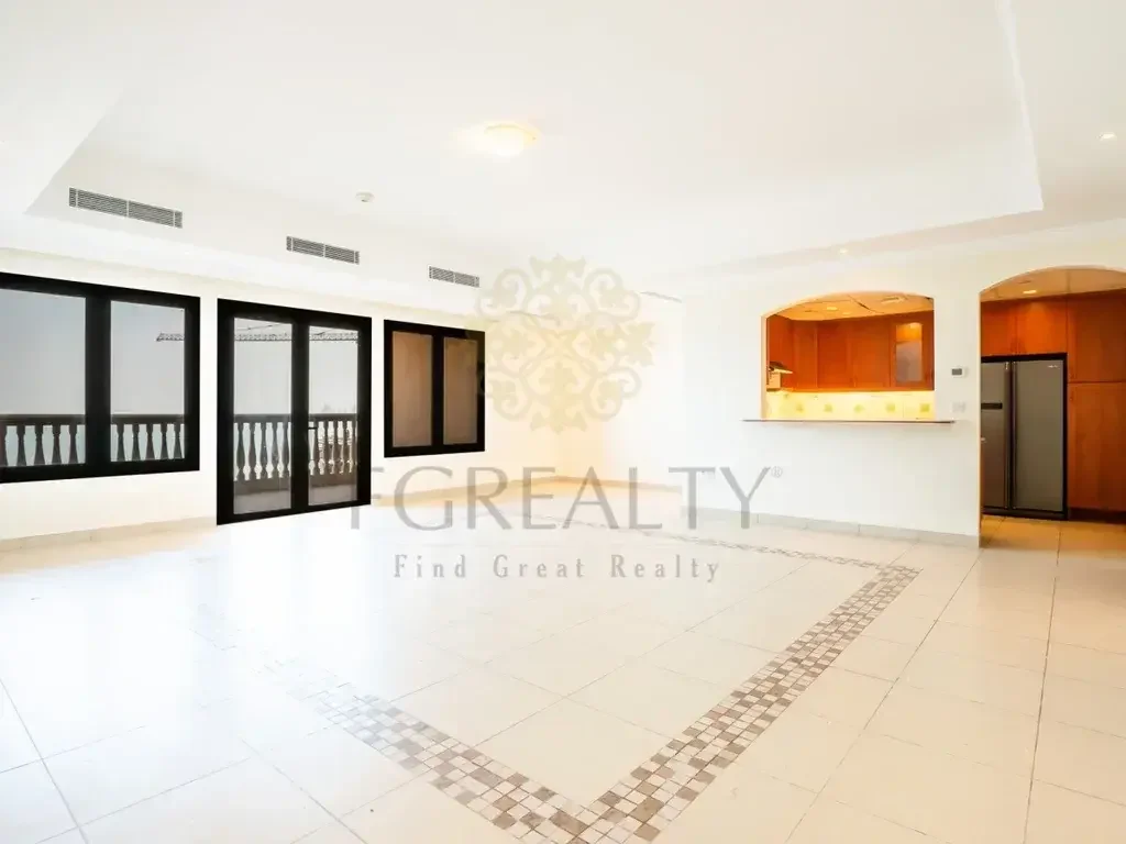 3 Bedrooms  Apartment  For Rent  in Doha -  The Pearl  Not Furnished