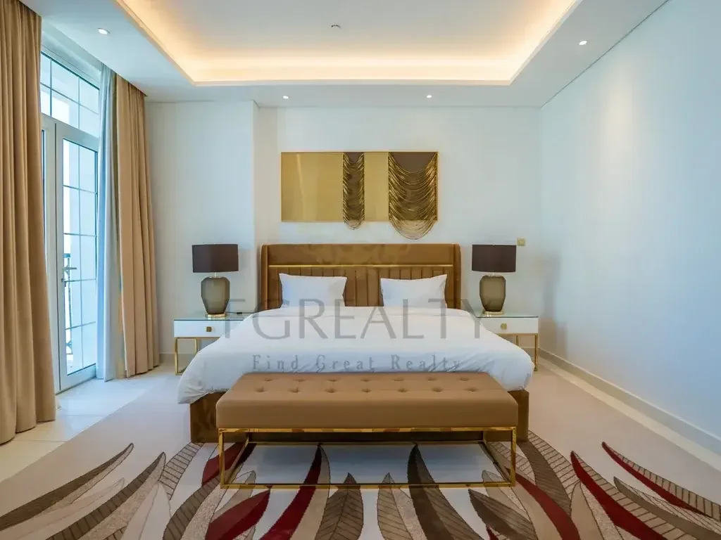 2 Bedrooms  Apartment  For Rent  in Doha -  The Pearl  Fully Furnished