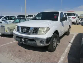 Nissan  Navara  2012  Manual  167,000 Km  4 Cylinder  Rear Wheel Drive (RWD)  Pick Up  White