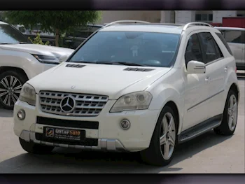 مرسيدس - بنز  ام ال  500  2011  اوتوماتيك  156,000 كم  8 سلندر  دفع رباعي  اس يو في  أبيض