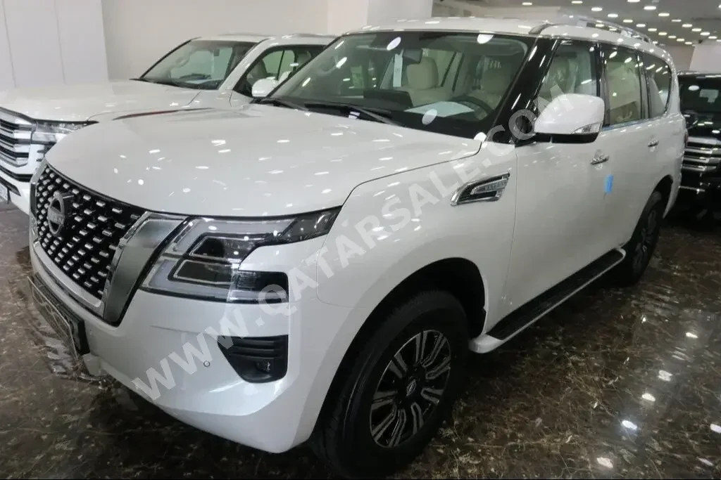 Nissan  Patrol  SE  2023  Automatic  0 Km  6 Cylinder  Four Wheel Drive (4WD)  SUV  White  With Warranty