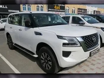 Nissan  Patrol  XE  2023  Automatic  0 Km  6 Cylinder  Four Wheel Drive (4WD)  SUV  White  With Warranty