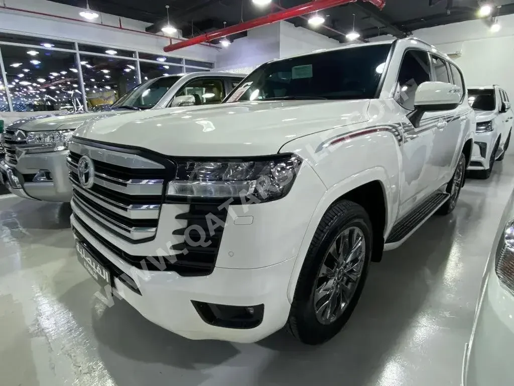 Toyota  Land Cruiser  GXR Twin Turbo  2022  Automatic  61,000 Km  6 Cylinder  Four Wheel Drive (4WD)  SUV  White  With Warranty