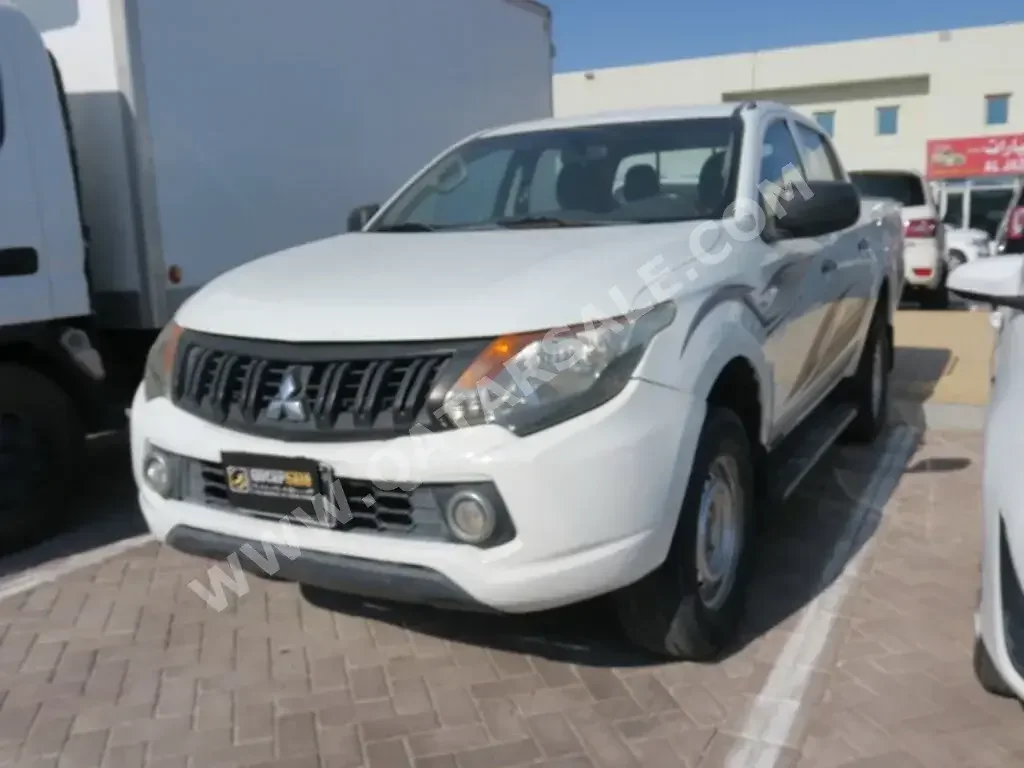 Mitsubishi  L 200  2016  Manual  190,000 Km  4 Cylinder  Rear Wheel Drive (RWD)  Pick Up  White