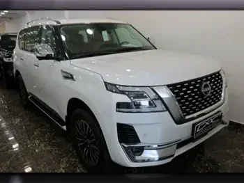 Nissan  Patrol  Platinum  2023  Automatic  0 Km  6 Cylinder  Four Wheel Drive (4WD)  SUV  White  With Warranty