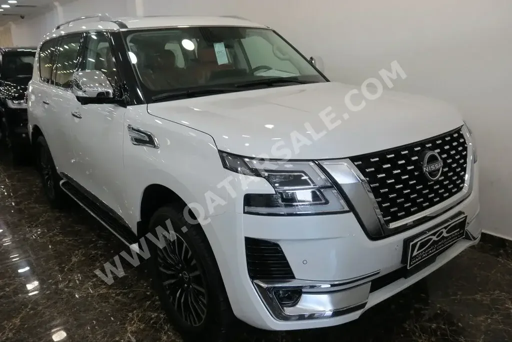 Nissan  Patrol  Platinum  2023  Automatic  0 Km  6 Cylinder  Four Wheel Drive (4WD)  SUV  White  With Warranty