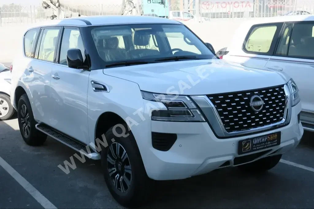 Nissan  Patrol  XE  2023  Automatic  0 Km  6 Cylinder  Four Wheel Drive (4WD)  SUV  White  With Warranty