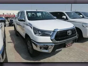 Toyota  Hilux  SR5  2024  Automatic  0 Km  4 Cylinder  Four Wheel Drive (4WD)  Pick Up  White  With Warranty