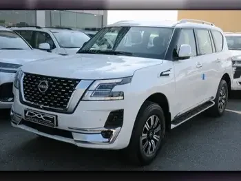 Nissan  Patrol  Titanium  2023  Automatic  0 Km  6 Cylinder  Four Wheel Drive (4WD)  SUV  White  With Warranty