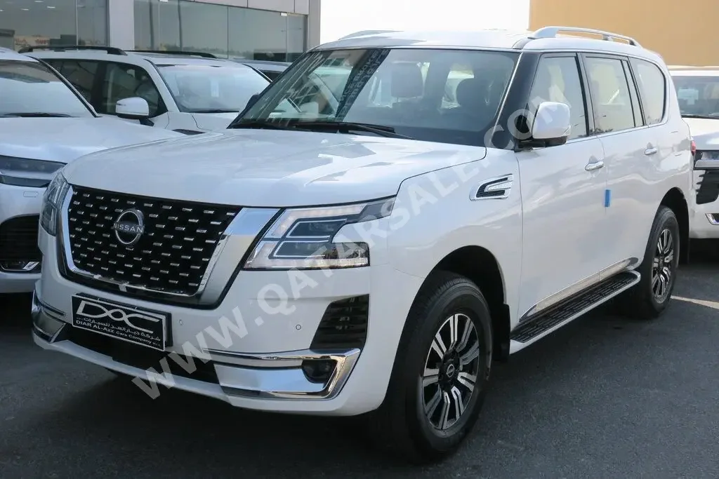 Nissan  Patrol  Titanium  2023  Automatic  0 Km  6 Cylinder  Four Wheel Drive (4WD)  SUV  White  With Warranty