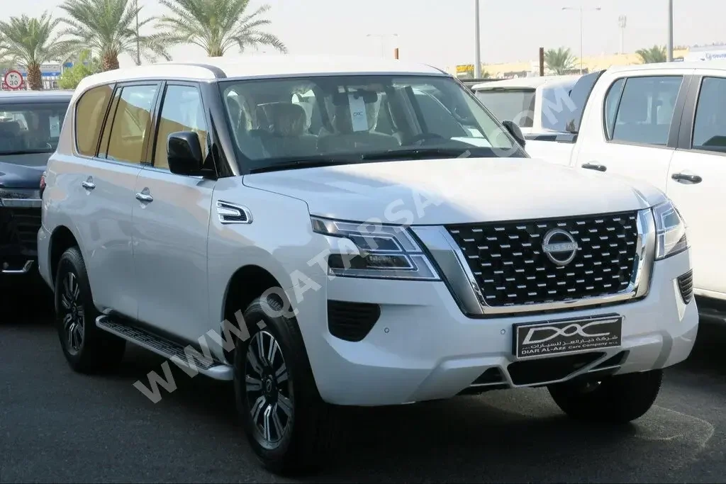 Nissan  Patrol  XE  2023  Automatic  0 Km  6 Cylinder  Four Wheel Drive (4WD)  SUV  White  With Warranty