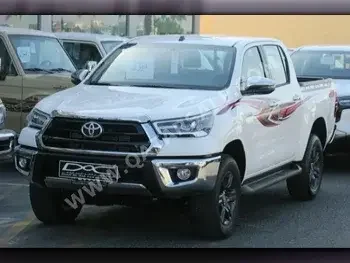 Toyota  Hilux  2023  Automatic  0 Km  4 Cylinder  Four Wheel Drive (4WD)  Pick Up  White  With Warranty