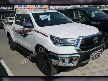 Toyota  Hilux  2023  Automatic  0 Km  4 Cylinder  Four Wheel Drive (4WD)  Pick Up  White  With Warranty