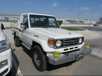 Toyota  Land Cruiser  LX  2005  Manual  602,000 Km  6 Cylinder  Four Wheel Drive (4WD)  Pick Up  White