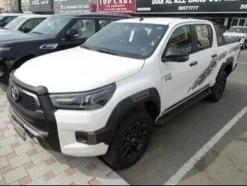 Toyota  Hilux  SR5 Adventure  2023  Automatic  0 Km  4 Cylinder  Four Wheel Drive (4WD)  Pick Up  White  With Warranty