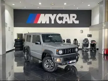 Suzuki  Jimny  2022  Automatic  34,000 Km  4 Cylinder  Four Wheel Drive (4WD)  SUV  Gray  With Warranty