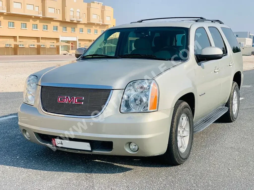  GMC  Yukon  2014  Automatic  227,000 Km  8 Cylinder  Four Wheel Drive (4WD)  SUV  Gold  With Warranty