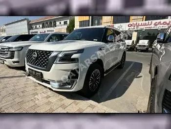  Nissan  Patrol  Platinum  2023  Automatic  4,600 Km  6 Cylinder  Four Wheel Drive (4WD)  SUV  White  With Warranty