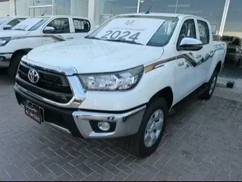 Toyota  Hilux  2024  Automatic  0 Km  4 Cylinder  Four Wheel Drive (4WD)  Pick Up  White  With Warranty