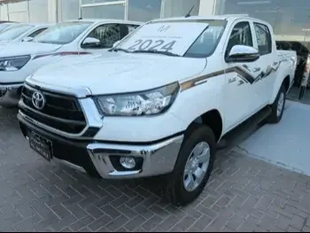 Toyota  Hilux  2024  Automatic  0 Km  4 Cylinder  Four Wheel Drive (4WD)  Pick Up  White  With Warranty