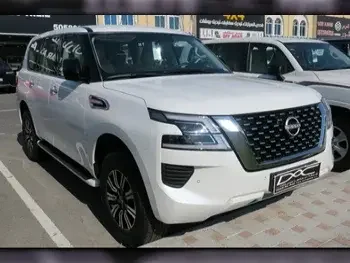 Nissan  Patrol  XE  2023  Automatic  0 Km  6 Cylinder  Four Wheel Drive (4WD)  SUV  White  With Warranty