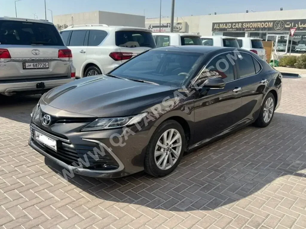 Toyota  Camry  GLE  2023  Automatic  20,000 Km  4 Cylinder  Front Wheel Drive (FWD)  Sedan  Brown  With Warranty