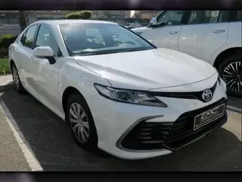 Toyota  Camry  LE  2024  Automatic  0 Km  4 Cylinder  Front Wheel Drive (FWD)  Sedan  White  With Warranty