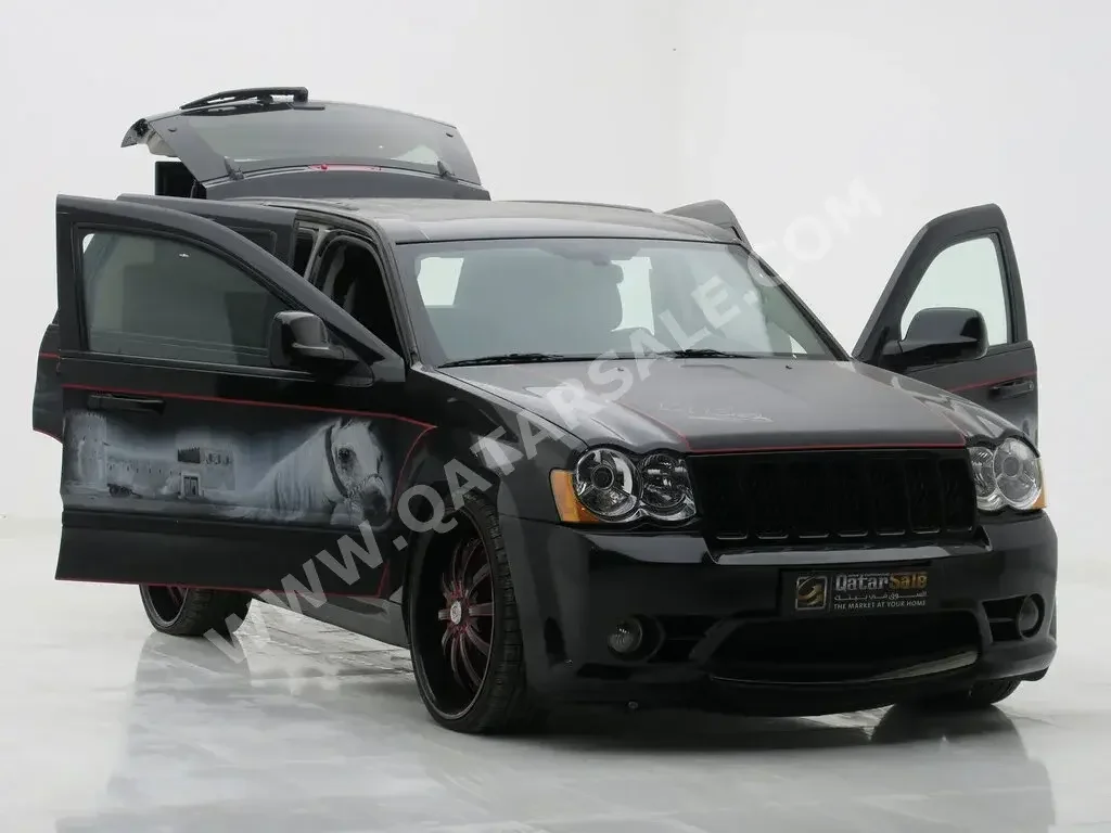 Jeep  Grand Cherokee  SRT-8  2010  Automatic  700 Km  8 Cylinder  Four Wheel Drive (4WD)  SUV  Black